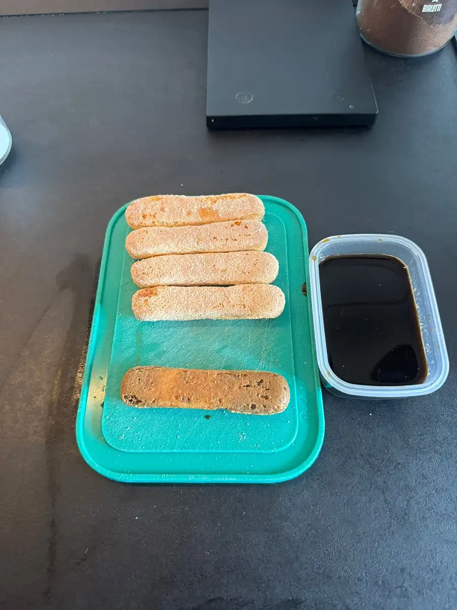 Ladyfingers soaked in coffee, ready for the dessert.