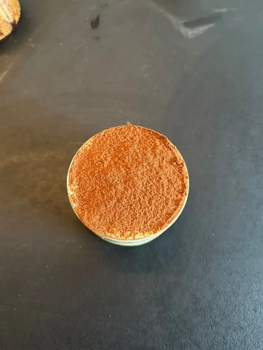 Top view of the tiramisu in a bowl, ready to be served.